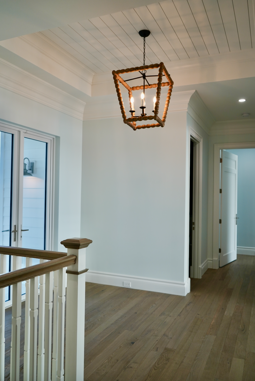 hallway with ceiling accents