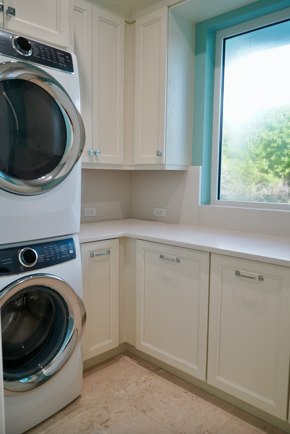 laundry room stacked appliances